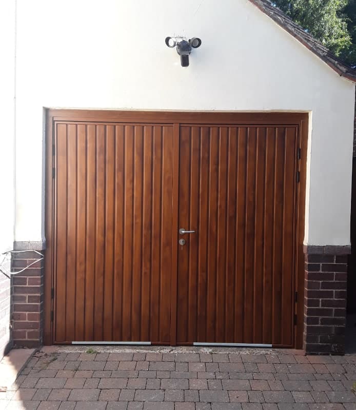 Side hinged garage doors