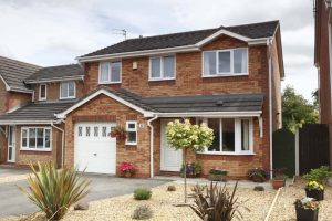 does a new garage door increase home value